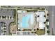 Aerial view of a community pool with lounge chairs, playground and other ammenities at 6415 Mentor Pl, Raleigh, NC 27616