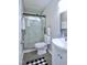 Modern bathroom featuring a tiled shower, and updated sink at 722 Orchard Dr, Graham, NC 27253