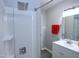 Updated bathroom featuring modern fixtures, sleek shower-tub, and a new vanity at 722 Orchard Dr, Graham, NC 27253