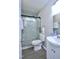Cozy bathroom showcasing a glass enclosed shower, toilet and sink at 722 Orchard Dr, Graham, NC 27253