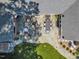Aerial view of the backyard patio with outdoor seating, including an outdoor dining area and comfortable lounge furniture at 801 Pinehurst Dr, Chapel Hill, NC 27517
