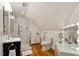 Bathroom features a vanity with sink, glass enclosed shower, and Hollywood style lighted mirror at 801 Pinehurst Dr, Chapel Hill, NC 27517
