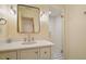 Bathroom features a white vanity with silver fixtures and a glass door shower at 801 Pinehurst Dr, Chapel Hill, NC 27517