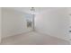 This bright and airy bedroom has plush carpeting and a large window at 833 Ember Dr, Durham, NC 27703