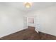 Bright bedroom features beautiful hardwood floors and an attached room with French doors at 833 Ember Dr, Durham, NC 27703
