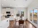 Breakfast nook featuring a glass table and direct access to the outdoor space at 833 Ember Dr, Durham, NC 27703