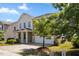 Charming two-story home with a two-car garage and well-maintained landscaping at 833 Ember Dr, Durham, NC 27703