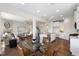 Open living space combines the living room and kitchen for seamless entertaining at 833 Ember Dr, Durham, NC 27703