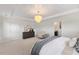Main bedroom features a decorative ceiling and light walls at 833 Ember Dr, Durham, NC 27703