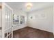 Bright office with three windows and wood floors at 833 Ember Dr, Durham, NC 27703