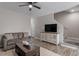 Comfortable living room with modern decor, including a stylish coffee table and media console at 874 John St, Clayton, NC 27520