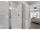 Modern bathroom features a stand-up shower with glass door at 886 John St, Clayton, NC 27520