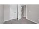 Bedroom with large closets and natural light features neutral walls at 886 John St, Clayton, NC 27520