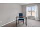 Bedroom with natural light features desk area and neutral walls at 886 John St, Clayton, NC 27520
