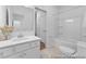 This bathroom features a bathtub shower, a sink with vanity, and neutral paint at 92 Horseshoe Pl # 9, Angier, NC 27501