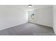 Neutral bedroom with natural light and neutral decor at 92 Horseshoe Pl # 9, Angier, NC 27501