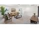 Spacious living room featuring stylish decor, neutral paint, and natural lighting at 92 Horseshoe Pl # 9, Angier, NC 27501
