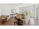 Bright living room with hardwood floors and large windows at 92 Horseshoe Pl # 9, Angier, NC 27501
