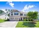 Charming two-story home featuring a two-car garage, landscaped yard and covered porch perfect for relaxing at 10 W Ravano Dr, Clayton, NC 27527