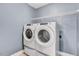 Convenient laundry room with modern, front-loading washer and dryer at 10 W Ravano Dr, Clayton, NC 27527