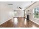 Spacious living room with hardwood floors, fireplace, and ample natural light at 10 W Ravano Dr, Clayton, NC 27527
