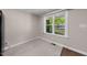 Cozy dining area with natural light, neutral colors, and tile floors at 104 Archdale Dr, Durham, NC 27707