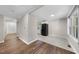 Inviting open floor plan connects the living room and kitchen, with hardwood and tile flooring at 104 Archdale Dr, Durham, NC 27707