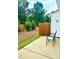 Inviting patio area with lawn and new fencing, ideal for outdoor relaxation and entertainment at 104 Fox Trail Ln, Morrisville, NC 27560