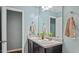 Bright bathroom featuring double sinks with decor at 106 Nations Cove, Louisburg, NC 27549