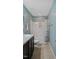 Bright bathroom features a shower, sink, and toilet at 106 Nations Cove, Louisburg, NC 27549
