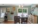 Comfortable dining area with a window offering views of the outdoor greenery at 106 Nations Cove, Louisburg, NC 27549