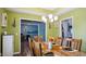 Dining room featuring a tray ceiling and views to other rooms at 106 Nations Cove, Louisburg, NC 27549