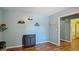 Stylish hallway features hard wood floors, modern decor and easy access to other rooms at 106 Nations Cove, Louisburg, NC 27549