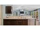 Open concept living space featuring a modern kitchen that overlooks an inviting living room at 106 Nations Cove, Louisburg, NC 27549