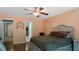 Cozy bedroom featuring a bed, natural lighting, and walk in closet access at 106 Nations Cove, Louisburg, NC 27549