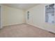 Neutral bedroom with two windows and plush carpet at 107 Ashley Forest Rd # B, Chapel Hill, NC 27514