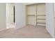 Bedroom closet with shelves at 107 Ashley Forest Rd # B, Chapel Hill, NC 27514