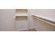 Walk-in closet with built in shelving and rod at 107 Ashley Forest Rd # B, Chapel Hill, NC 27514