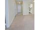 Neutral carpeted living room featuring white trim and natural light at 107 Ashley Forest Rd # B, Chapel Hill, NC 27514