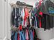 Walk-in closet with ample shelving and hanging storage for an organized wardrobe at 107 Regiment Way, Durham, NC 27705