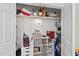 Walk-in closet features storage solutions with shelving and cubbies for organization at 107 Regiment Way, Durham, NC 27705