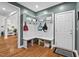 A nicely appointed mudroom provides storage, bench seating, and convenient entry at 107 Regiment Way, Durham, NC 27705