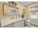 Charming bathroom with updated vanity, mirror, and fixtures at 108 Ripplewater Ln, Cary, NC 27518