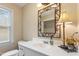 Bathroom with updated vanity, decor and natural light at 108 Ripplewater Ln, Cary, NC 27518