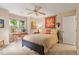 Serene bedroom featuring a ceiling fan, neutral decor and natural light at 108 Ripplewater Ln, Cary, NC 27518