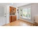 Cozy breakfast nook with bay window and custom built-in cabinetry and countertops at 108 Ripplewater Ln, Cary, NC 27518