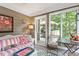 Inviting sun room with comfortable seating and natural light at 108 Ripplewater Ln, Cary, NC 27518