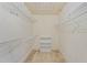 Spacious walk-in closet with built in shelving and wire storage at 108 Ripplewater Ln, Cary, NC 27518
