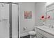 Modern bathroom with a walk-in shower, sleek vanity, and contemporary finishes at 109 Big Timber Path, Holly Springs, NC 27540