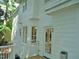 Side angle view of a two-story house showcasing its backyard at 1104 Barrow Nook Ct, Apex, NC 27502